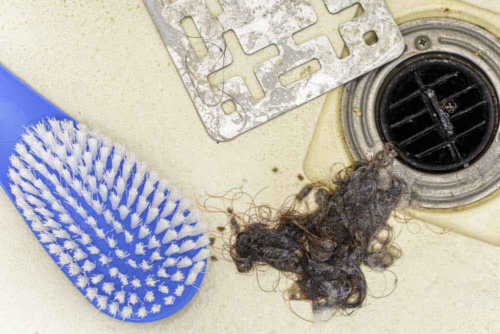 residue of hair, soap scum from shower drain Scottsdale, AZ